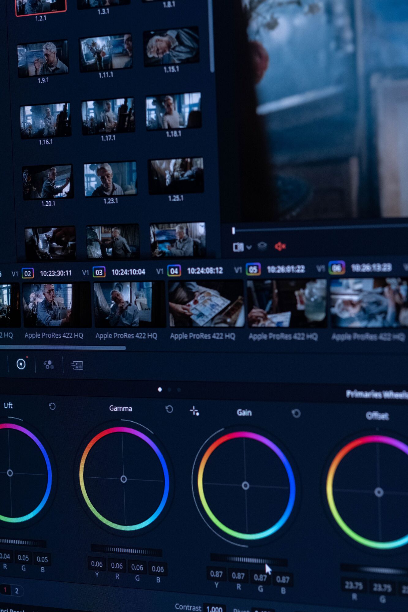 A close view of color-grading curves and wheels on an editing monitor.